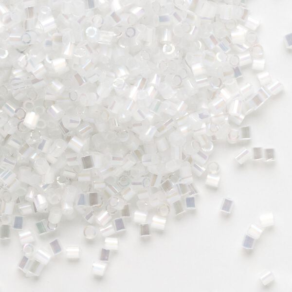 Seed bead, Dyna-Mites™, glass, pkg/1/2kg, #11 cut-off beads cut-off round, translucent silky rainbow white, (363R 11/0 CUT OFF). image number 0