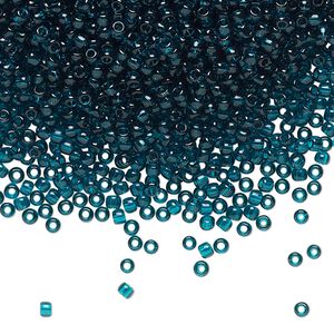 Seed bead, TOHO BEADS®, glass, pkg/250g, #11 round, transparent Capri blue (TR-11-7BD).
