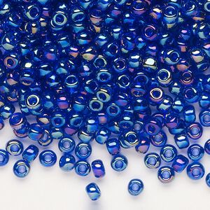 Seed bead, Dyna-Mites™, glass, transparent rainbow iris blue, #6 round. Sold per 40-gram pkg.