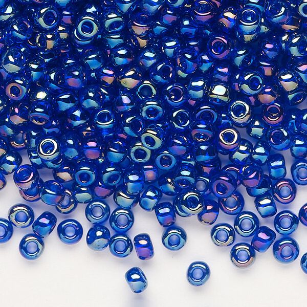 Seed bead, Dyna-Mites™, glass, transparent rainbow iris blue, #6 round. Sold per 40-gram pkg. image number 0