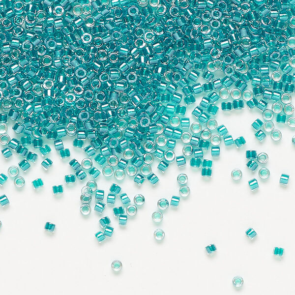 Seed bead, Delica®, glass, pkg/50g, #11 round, translucent dark aqua-lined luster crystal clear (DB-0918). image number 0