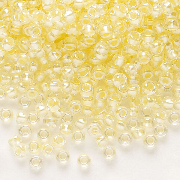 Seed bead, Preciosa Ornela Czech glass, pkg/50g, #8 rocaille, translucent color-lined luster pastel yellow, (382PY). image number 0