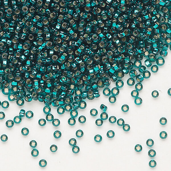 Seed bead, Preciosa Ornela Czech glass, pkg/50g, #11 rocaille, transparent silver-lined teal, (57710). image number 0