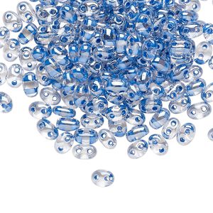 Seed bead, Preciosa Twin™ Czech glass, pkg/10g, 5x2.5mm oval, transparent denim blue terra color-lined clear, (38638).
