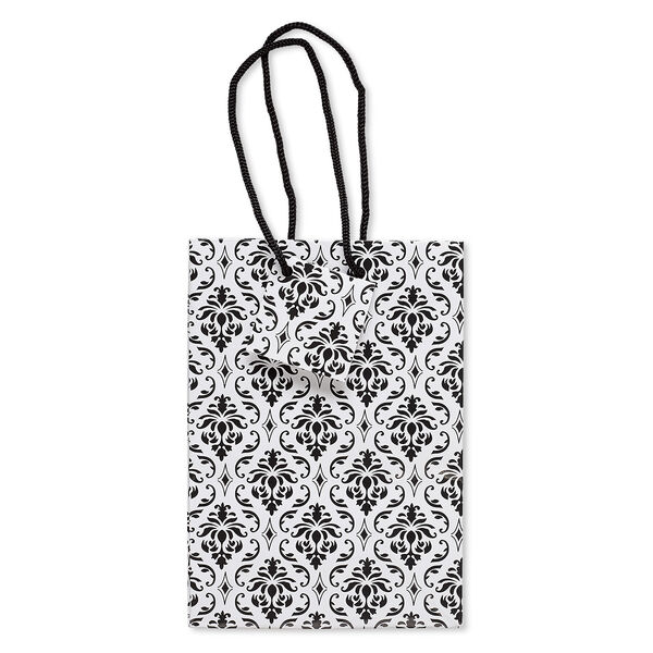 Gift bag, paper and nylon, black and white, 6-3/4 x 4-3/4 inches with damask pattern and handle with tag. Sold per pkg of 100. image number 0