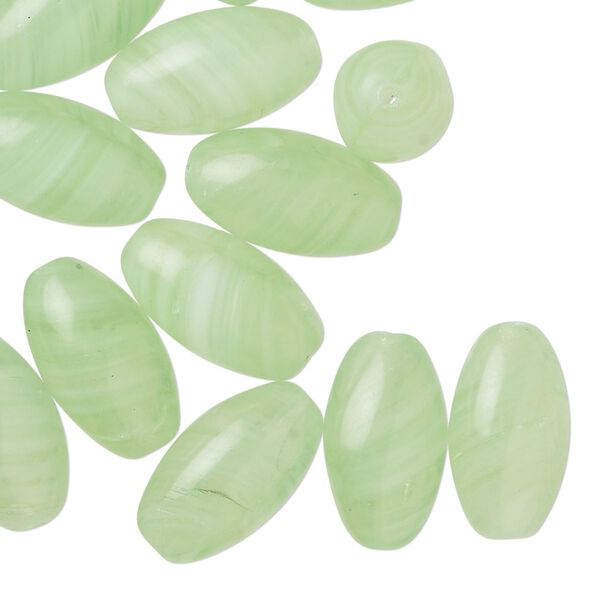 Bead, Czech pressed glass, translucent light mint green, 16x10mm oval. Sold per 2-ounce pkg, approximately 30 beads. image number 0