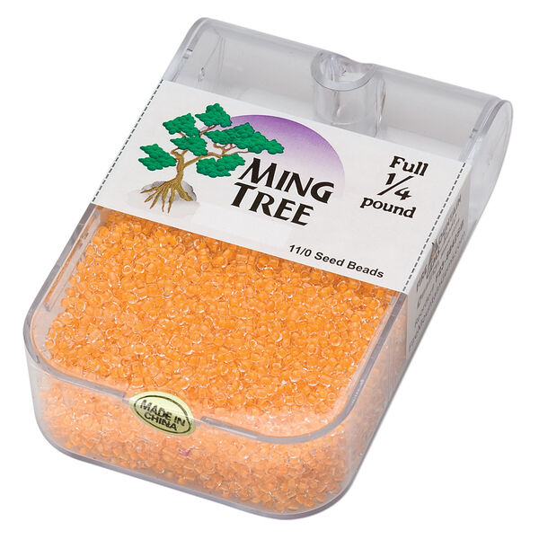 Seed bead, Ming Tree™, glass, pkg/1/4 pound, #11 round, transparent color-lined light orange. image number 0