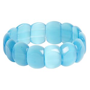 Bracelet, Just for Fun, stretch, cat's eye glass (fiber optic glass), turquoise blue, 6-inch. Sold individually.
