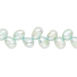 Pearl, cultured freshwater (dyed), teal green, 7x5mm-9x6mm herringbone-drilled rice with 0.4-0.6mm hole, D grade, Mohs hardness 2-1/2 to 4. Sold per 14-inch strand.