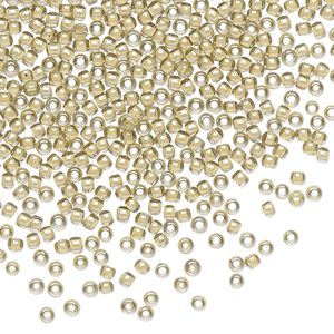 Seed bead, TOHO BEADS®, glass, pkg/250g, #11 round, opaque orange crème-lined black diamond (TR-11-369).