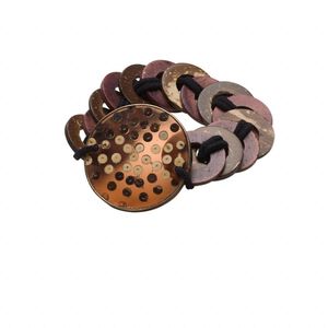 Bracelet, coco wood and epoxy, red and brown, 42mm coin, 7-1/2 inch stretch. Sold individually.