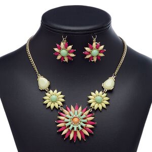 Necklace and earring set, acrylic rhinestone / acrylic / glass rhinestone / gold-finished brass / steel / "pewter" (zinc-based alloy), multicolored, 50x50mm flower, 18-inch necklace with 3-inch extender chain and lobster claw clasp, 29mm earrings with flower and leverback ear wire. Sold per set.