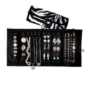 Jewelry roll, polyester and leatherette, zebra print with ribbon tie, 19 x 9-1/2 inches, 9-1/2 x 6 inches folded. Sold individually.