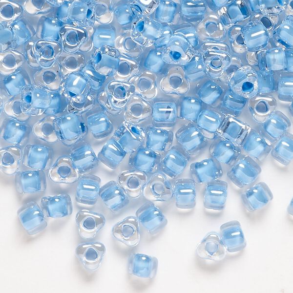 Seed bead, Miyuki, glass, transparent clear color-lined sky blue, (TR1116), #5 triangle. Sold per 25-gram pkg. image number 0