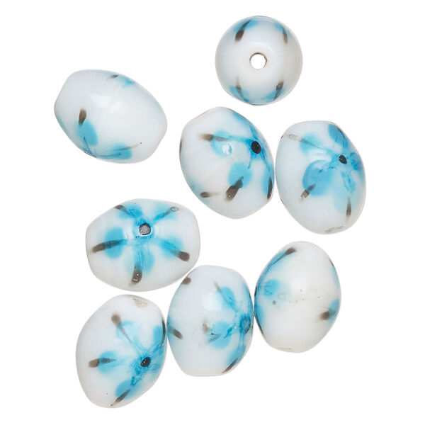 Bead, lampworked glass, opaque white / black / sky blue, 14x11mm-13x10mm oval with painted flower design. Sold per pkg of 8. image number 0