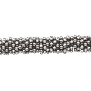 Bead, antiqued sterling silver, 7x1mm beaded snowflake. Sold per 1-troy ounce pkg, approximately 60-80 beads.