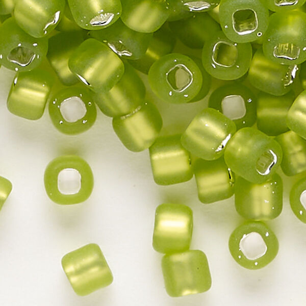 Seed bead, Dyna-Mites™, glass, silver-lined translucent matte light green, #6 round with square hole. Sold per 1/2 kilogram pkg. image number 0
