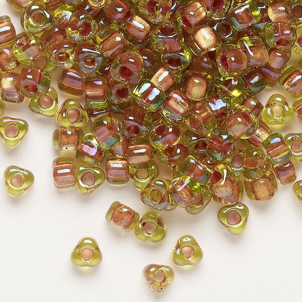 Seed bead, Miyuki, glass, transparent lime color-lined copper, (TR1818), #5 triangle. Sold per 25-gram pkg. image number 0