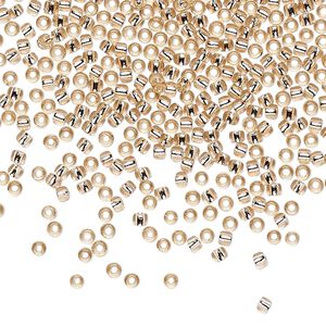 Seed bead, TOHO BEADS®, glass, pkg/250g, #11 round, transparent silver-lined rosaline (TR-11-31).