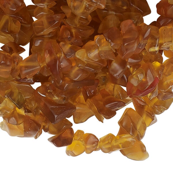 Bead, glass 1pkg1, translucent dark golden brown, small to extra-large chip, 30-inch strand. image number 1