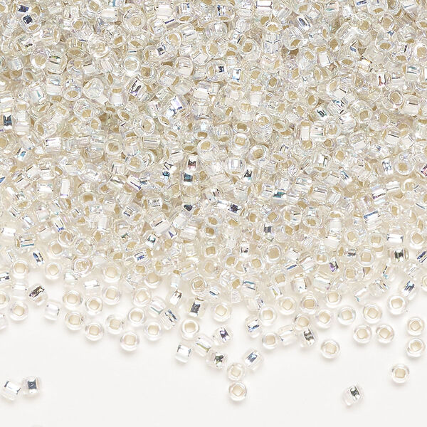 Seed bead, Dyna-Mites™, glass, pkg/1/2kg, #11 round, translucent silver-lined rainbow clear, (64R:SR 11/0 SR). image number 0