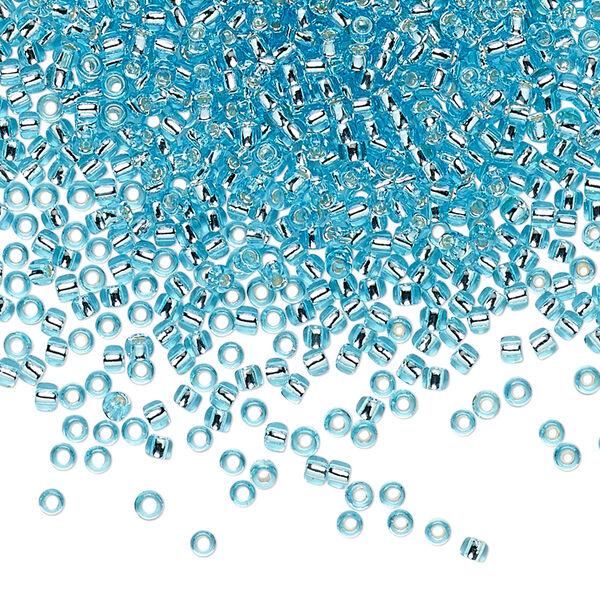 Seed bead, TOHO BEADS®, glass, pkg/7.5g, #11 round, transparent silver-lined aquamarine (TR-11-23). image number 0