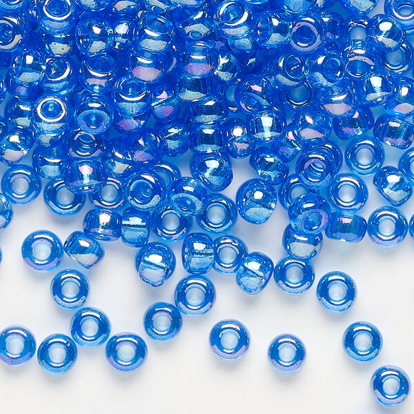Seed bead, Miyuki, glass, pkg/25g, #6 rocaille, translucent rainbow light blue (RR-261). image number 0
