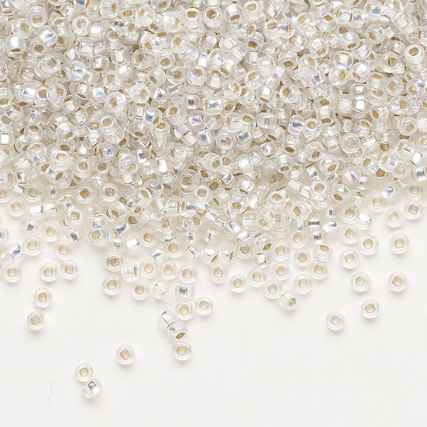 Seed bead, Preciosa Ornela Czech glass, pkg/50g, #11 rocaille, translucent silver-lined rainbow clear, (78109). image number 0