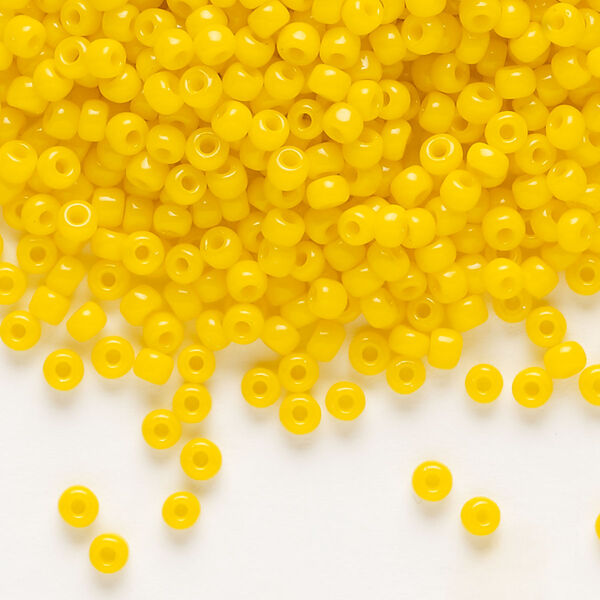 Seed bead, Dyna-Mites™, glass, opaque dark yellow, #8 round. Sold per 40-gram pkg. image number 0