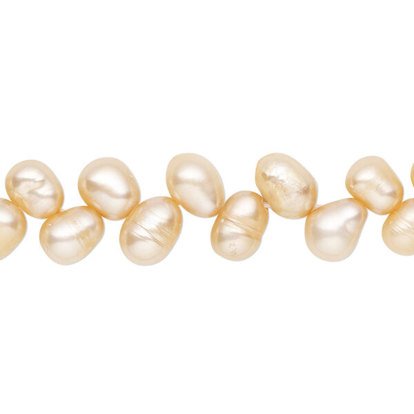 Pearl, cultured freshwater (natural), peach, 6x5mm-7x6mm herringbone-drilled rice with 0.4-0.6mm hole, C- grade, Mohs hardness 2-1/2 to 4. Sold per 14-inch strand. image number 0