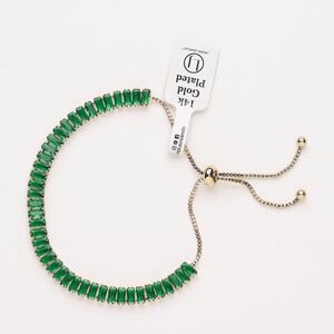 Bracelet, adjustable, brass / glass / silicone, pkg/1, 6 to 10 inches, gold plate and emerald.