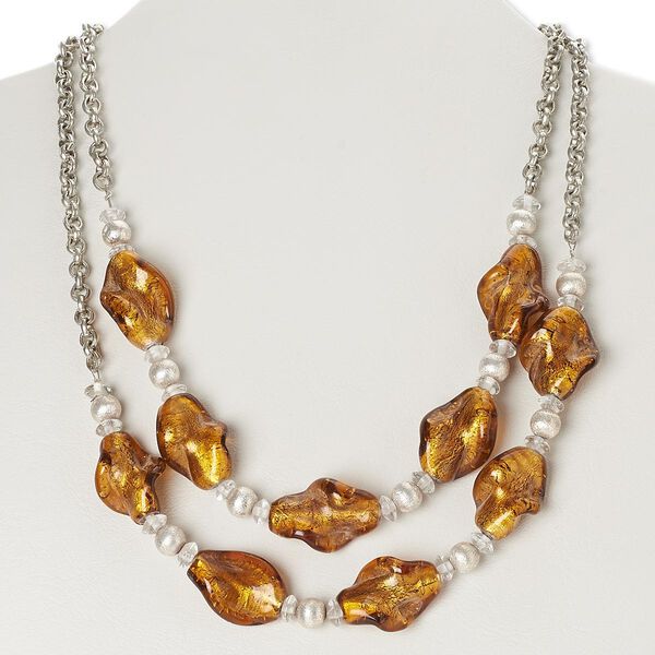 Necklace, lampworked glass / silver-finished brass / steel, honey and clear with silver-colored foil, brushed twisted oval, 38-inch continuous loop. Sold individually. image number 0