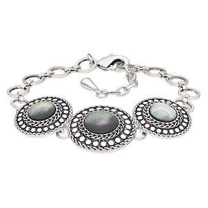 Bracelet, black lip shell (natural) / antique silver-plated brass / steel / "pewter" (zinc-based alloy), 25mm wide with round, 7 inches with 1-inch extender chain and lobster claw clasp. Sold individually.