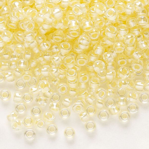 Seed bead, Preciosa Ornela Czech glass, pkg/500g, #8 rocaille, translucent color-lined luster pastel yellow, (382PY). image number 0