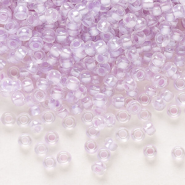 Seed bead, Preciosa Ornela Czech glass, pkg/50g, #8 rocaille, translucent color-lined luster pastel violet, (382PV). image number 0