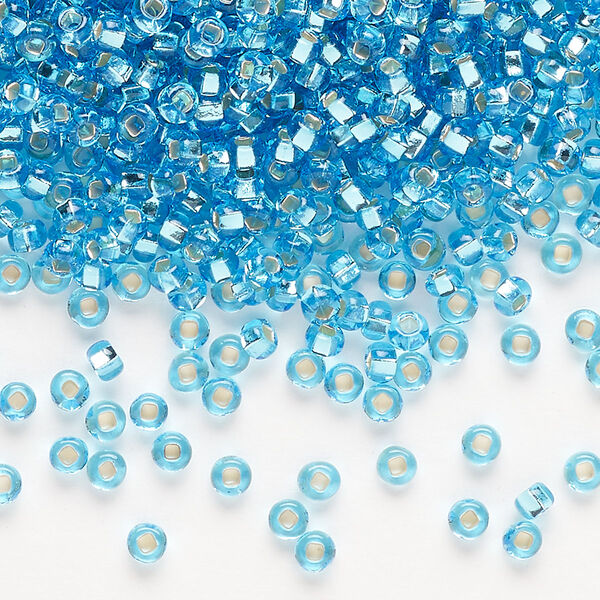 Seed bead, Preciosa Ornela Czech glass, pkg/500g, #8 rocaille, transparent silver-lined sky blue, (67010). image number 0