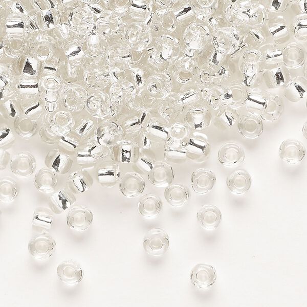 Seed bead, Dyna-Mites™, glass, transparent silver-lined clear, #6 round. Sold per 40-gram pkg. image number 0