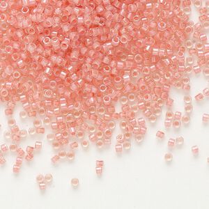 Seed bead, Delica®, glass, pkg/50g, #11 round, translucent coral-lined luster crystal clear (DB-0070).