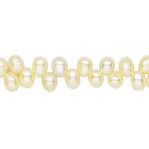 Pearl, cultured freshwater (dyed), yellow, 5x4mm-7x5mm top-drilled rice with 0.4-0.5mm hole, D grade, Mohs hardness 2-1/2 to 4. Sold per 15-inch strand.