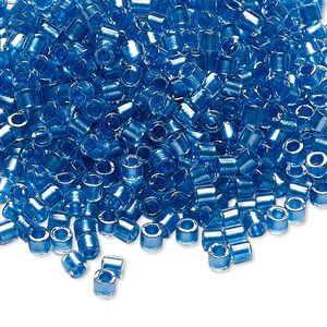Seed bead, Delica®, glass, pkg/250g, #8 round, translucent blue-lined luster crystal clear (DBL-0905).