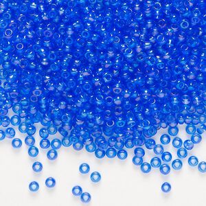 Seed bead, Preciosa Ornela Czech glass, pkg/50g, #10 rocaille, translucent rainbow light blue, (31050).