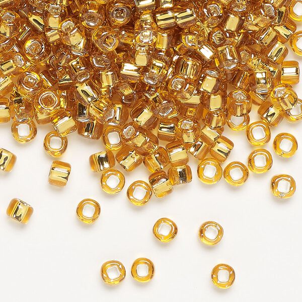 Seed bead, Dyna-Mites™, glass, silver-lined translucent gold, #6 round with square hole. Sold per 40-gram pkg. image number 0