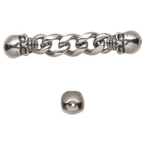 Focal, antiqued stainless steel, 53x9mm with 12.5x9mm skull and 8.8mm curb chain with 2 holes. Sold individually.