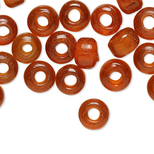 Bead, glass, transparent orange, 9x7mm crow. Sold per pkg of 100. image number 0