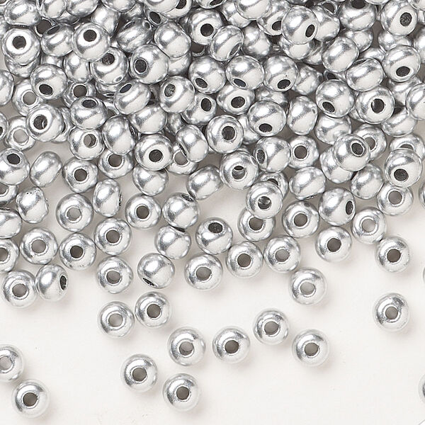 Seed bead, Preciosa Ornela Czech glass, pkg/50g, #6 rocaille, opaque soft silver metallic alabaster, (01700). image number 0