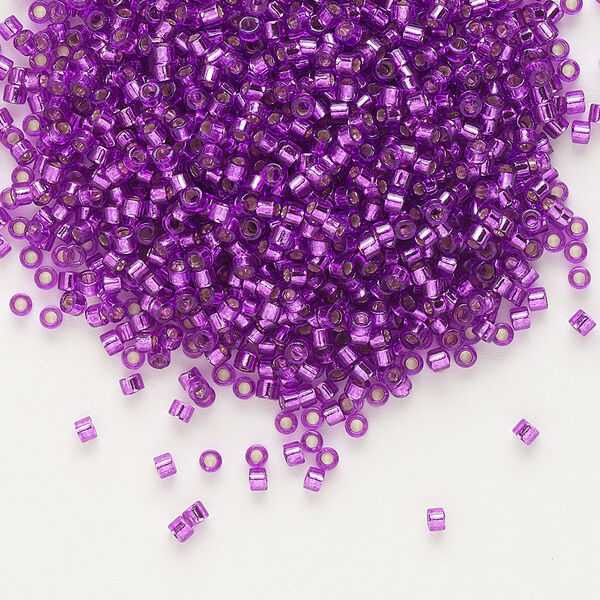 Seed bead, Delica®, glass, pkg/7.5g, #11 round, transparent outside dyed silver-lined magenta (DB-1345). image number 0