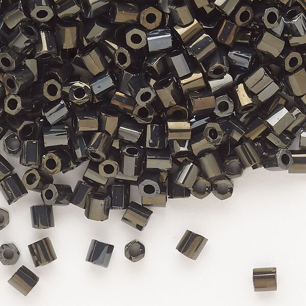 Seed bead, Dyna-Mites™, glass, opaque iris gold, #6 hex 2-cut. Sold per 40-gram pkg. image number 0