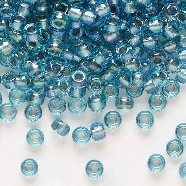Seed bead, Miyuki, glass, pkg/25g, #6 rocaille, translucent dusk-lined luster crystal clear (RR-1824). image number 0