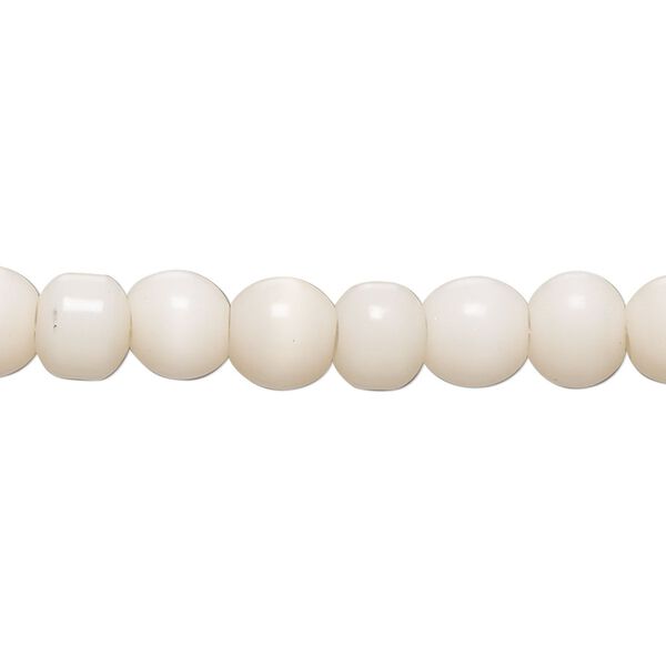 Bead, cat's eye glass (fiber optic glass), soft pink, 5-7mm round. Sold per 14-inch strand, approximately 55 beads. image number 0