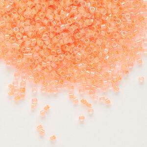 Seed bead, Delica®, glass, pkg/250g, #11 round, translucent luminous inside dyed color creamsicle (DB-2033).